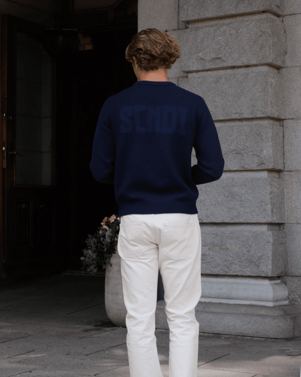 Navy sweater with a minimalist Scandinavian design by SCNDI
